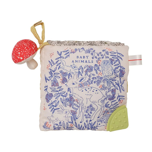 Baby book with illustrations of baby animals and a mushroom toy on a white background