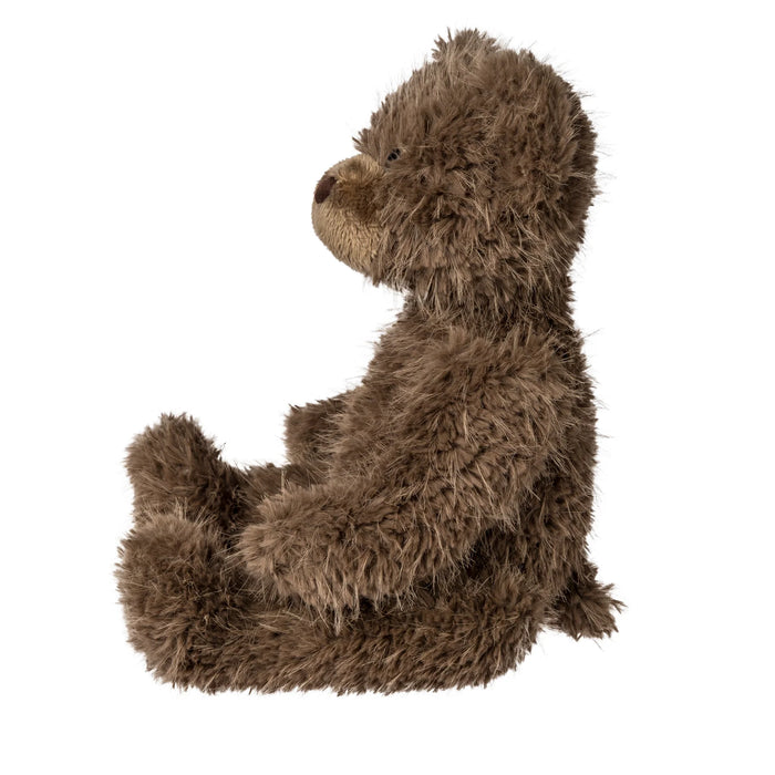 Brown plush bear on a white background
