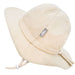 Beige sun hat with a label on a white background