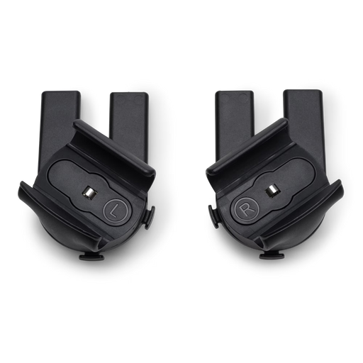 Two black plastic components on a white background