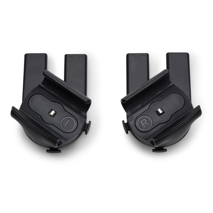 Two black plastic components on a white background