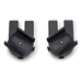 Two black plastic components on a white background