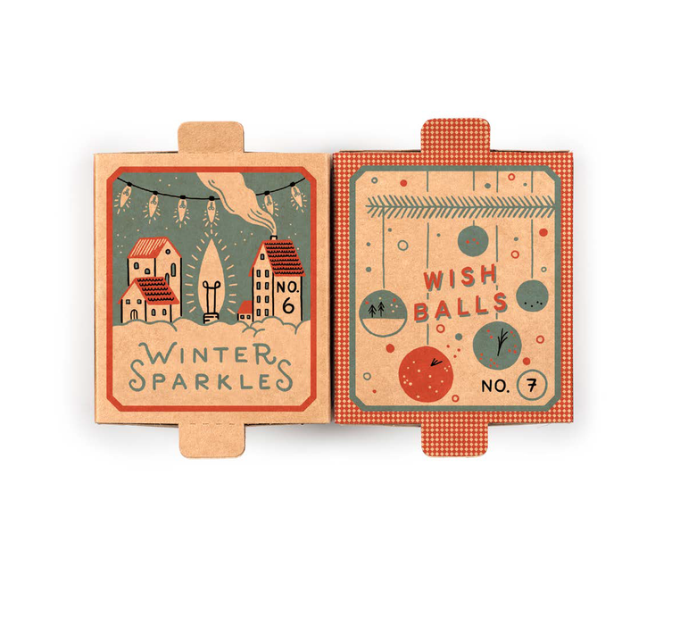 Two decorative boxes with 'Winter Sparkles' and 'Wish Balls' text on a white background feature handpainted wooden ornaments inside