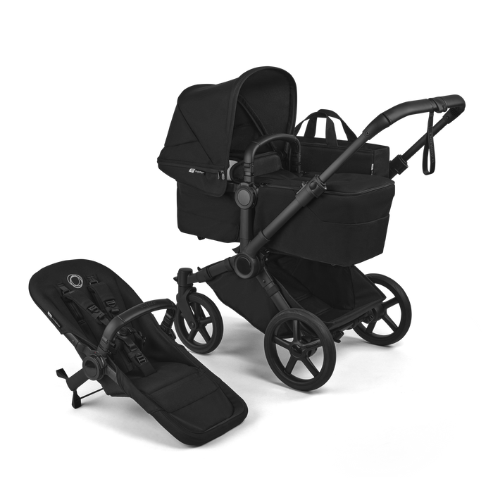 Black stroller and baby seat on a white background