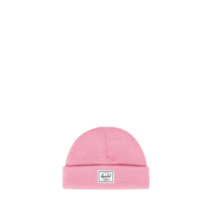 A pink knit beanie hat with a folded cuff and a small white Herschel logo patch in the center on a white background.