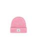 A pink knit beanie hat with a folded cuff and a small white Herschel brand patch on the front against a white background