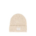 A knit cuffed beanie hat in a light beige heathered texture, featuring a small rectangular woven label on the front cuff, photographed against a white background