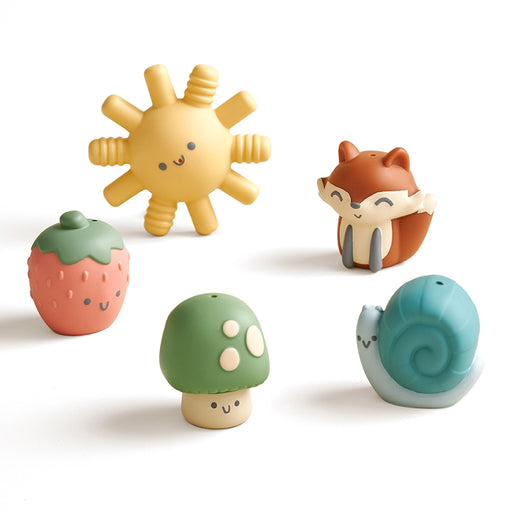 Set of colorful children's bath toys including a sun, strawberry, mushroom, and snail on a white background