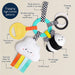 Baby toy with various features labeled on a beige background