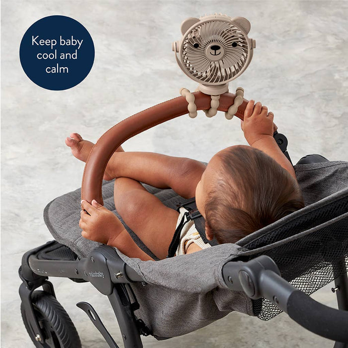 Baby in a stroller with an itzy ritzy fan attached, text 'Keep baby cool and calm'.