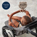 Baby in a stroller with an itzy ritzy fan attached, text 'Keep baby cool and calm'.