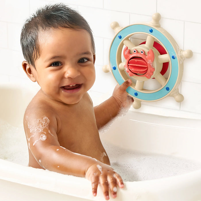 Child playing with a bath toy in a bathtub