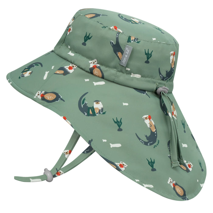 Green children's sun hat with animal pattern on a white background
