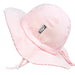Pink and white striped sun hat with a brand label on a white background