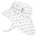 White baby hat with dachshund pattern on a white background