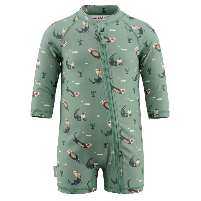 Green baby romper with animal pattern on a white background