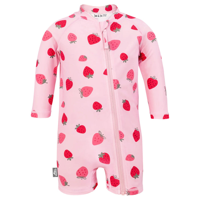 Pink baby onesie with strawberry pattern on a white background