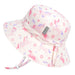 Pink children's sun hat with unicorn pattern on a white background