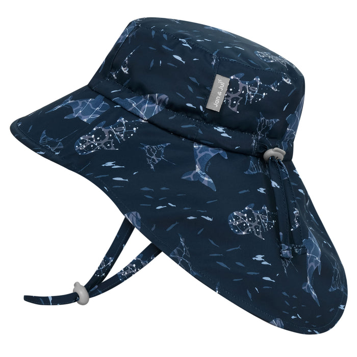 Navy bucket hat with shark pattern on a white background