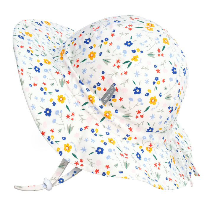 Floral-patterned baby sun hat with a matching headband on a white background