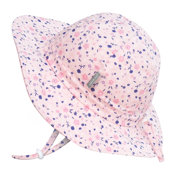 Floral patterned sun hat on a white background