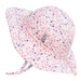 Floral patterned sun hat on a white background
