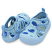 Light blue children's sandals with whale pattern on a white background