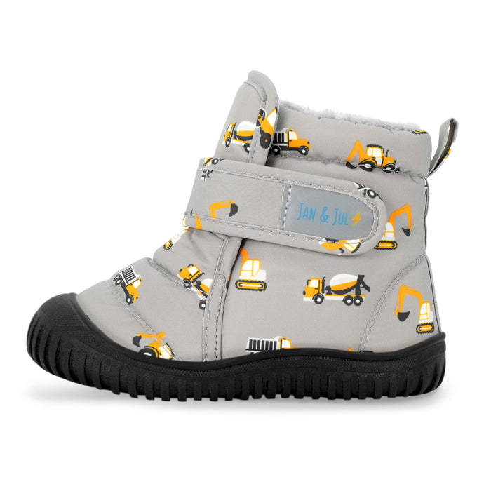 Gray children's boot with construction vehicle pattern on a white background