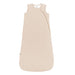 Soft beige baby sleeping bag on a white background