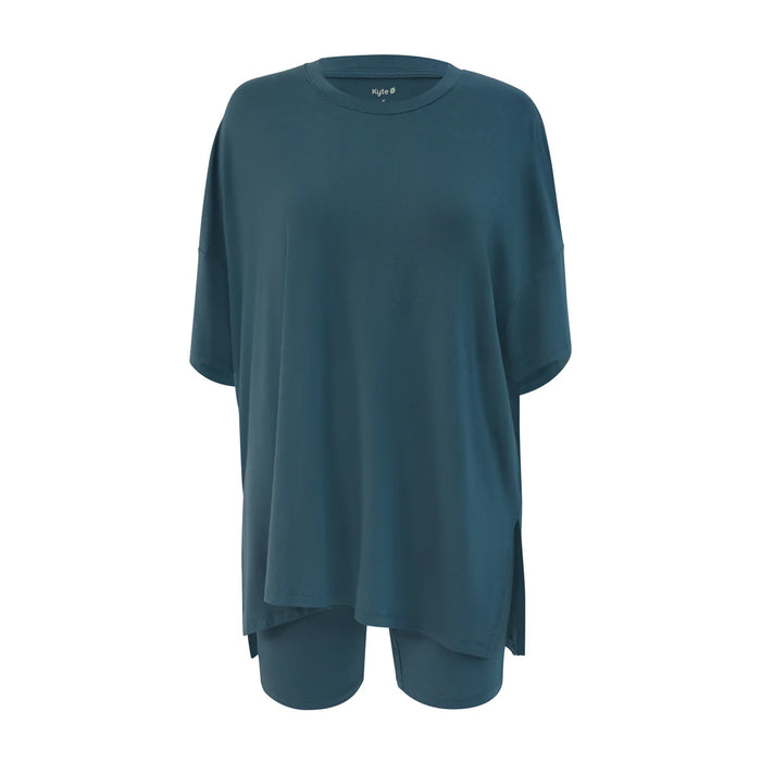 Teal tunic with a high-low hem on a white background