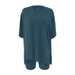 Teal tunic with a high-low hem on a white background