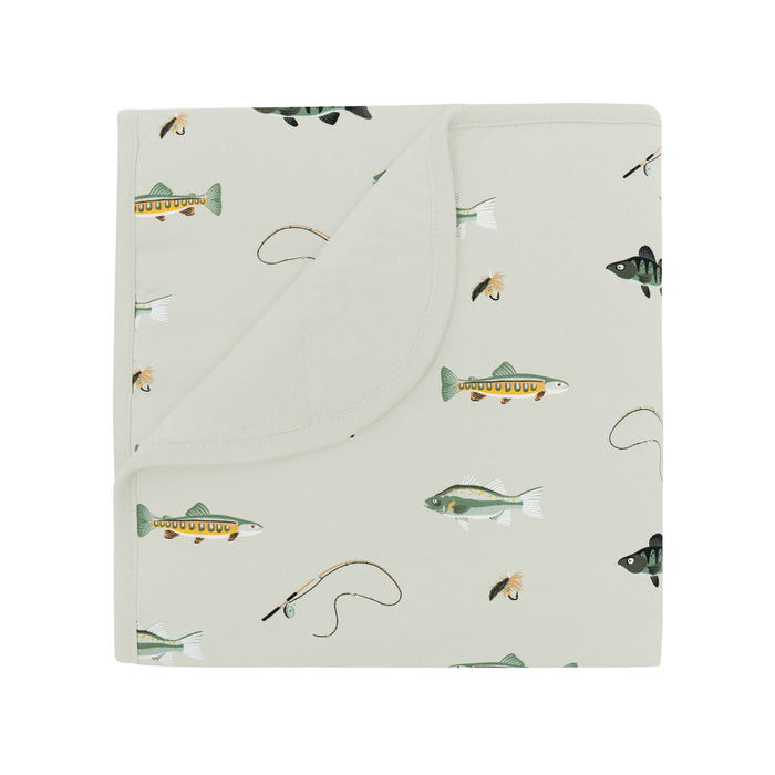 Flannel fabric with fish and fishing rod pattern on a white background
