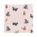 Blanket with butterfly pattern on a light pink background