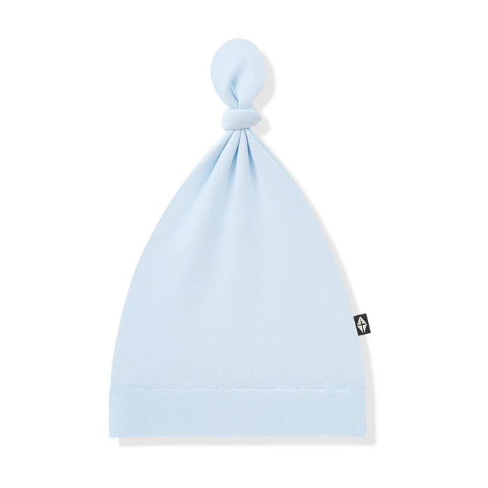 Light blue baby hat with a knot on top against a white background