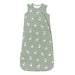 Green baby sleeping bag with duck pattern on a white background