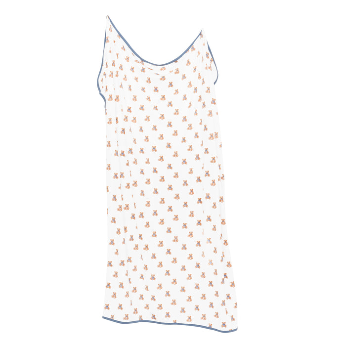 White blanket with small bear pattern on a white background