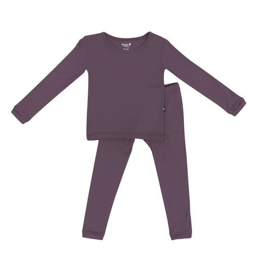 Purple children's pajama set on a white background