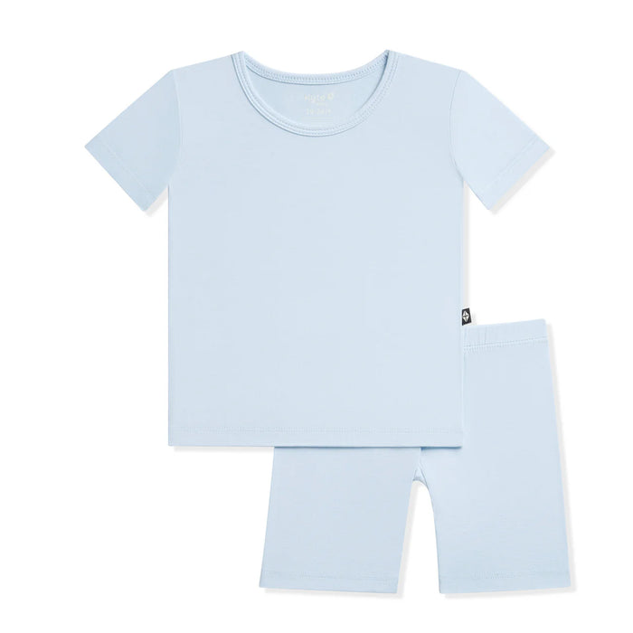 Light blue t-shirt and shorts set on a white background