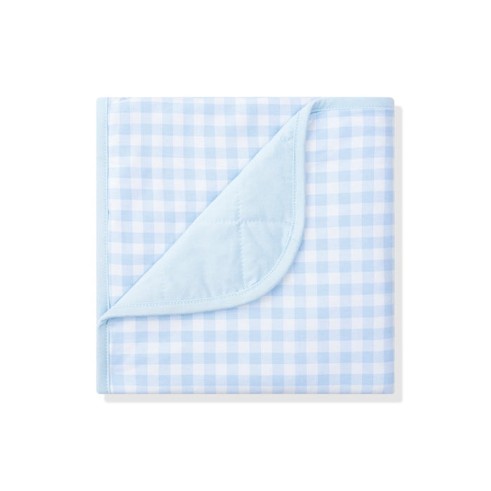 Blue and white checkered blanket on a white background
