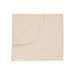 Beige Baby blanket folded on a white background