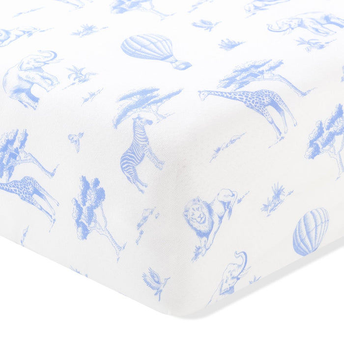 Fitted sheet with blue animal pattern on a white background