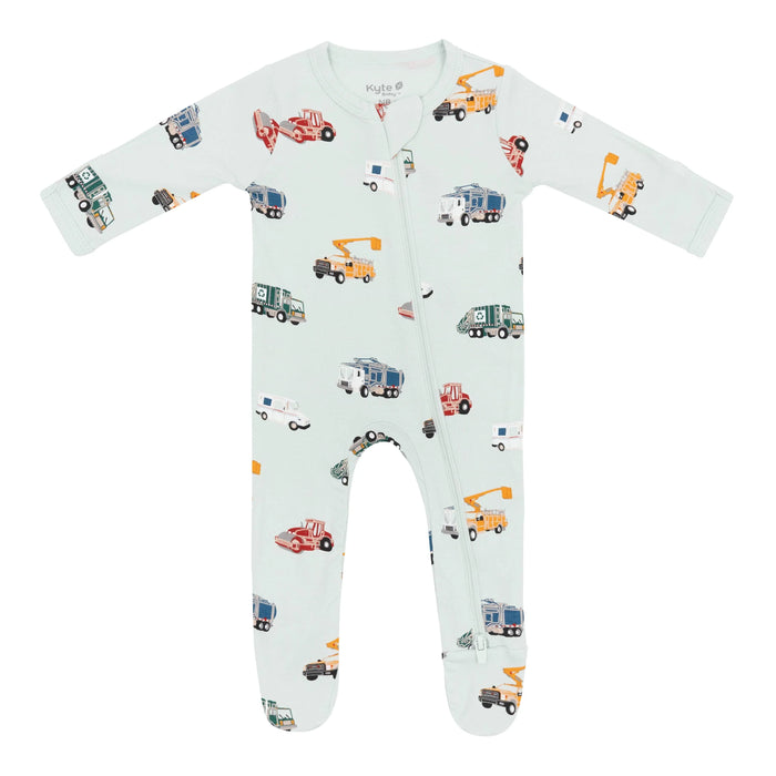 Baby onesie with vehicle pattern on a white background