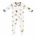Baby onesie with cow pattern on a white background