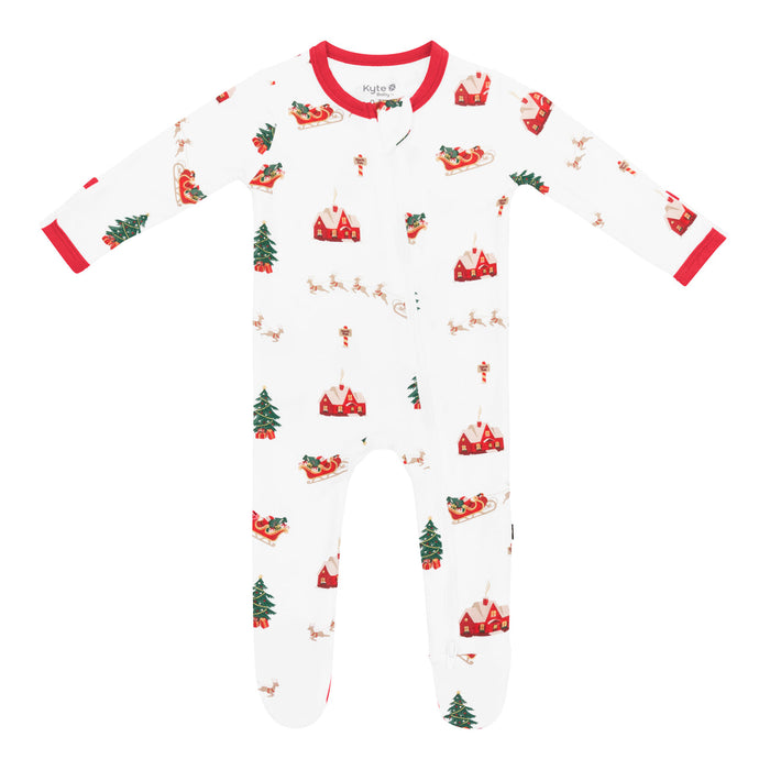 Kyte Children's onesie with Christmas-themed pattern on a white background