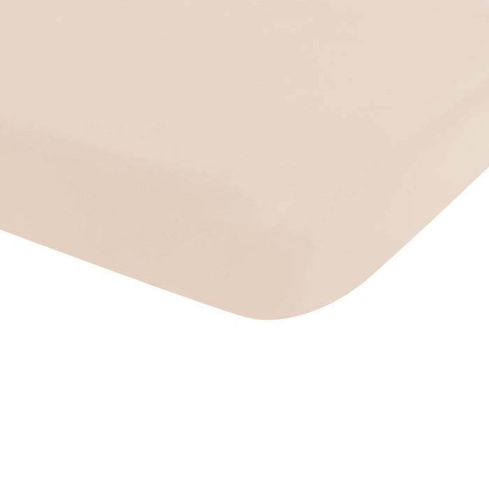 Beige corner of a fitted crib sheet
