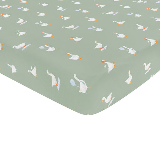 Fitted sheet with goose pattern on a green background