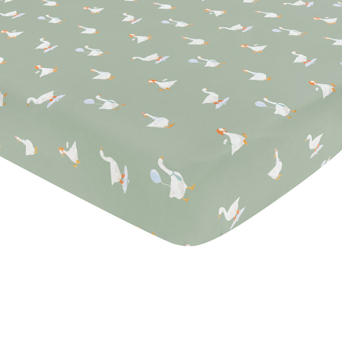 Fitted sheet with goose pattern on a green background