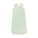 Light green baby sleeping bag on a white background