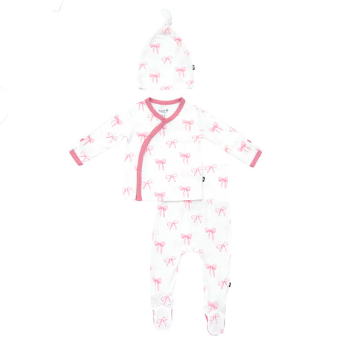 White baby newborn set in bamboo with pink bow pattern on a white background