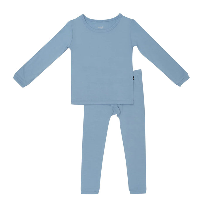 Blue children's pajama set on a white background